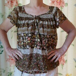 Blouse, sheer print over dark brown lining, elastic bottom hem